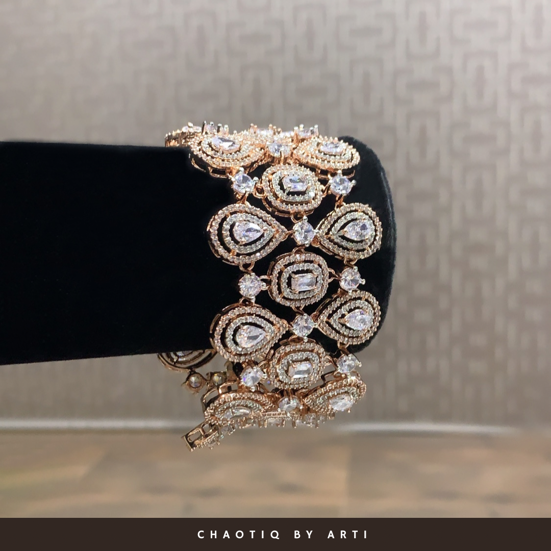 Broad shaped diamond studded tennis bracelet