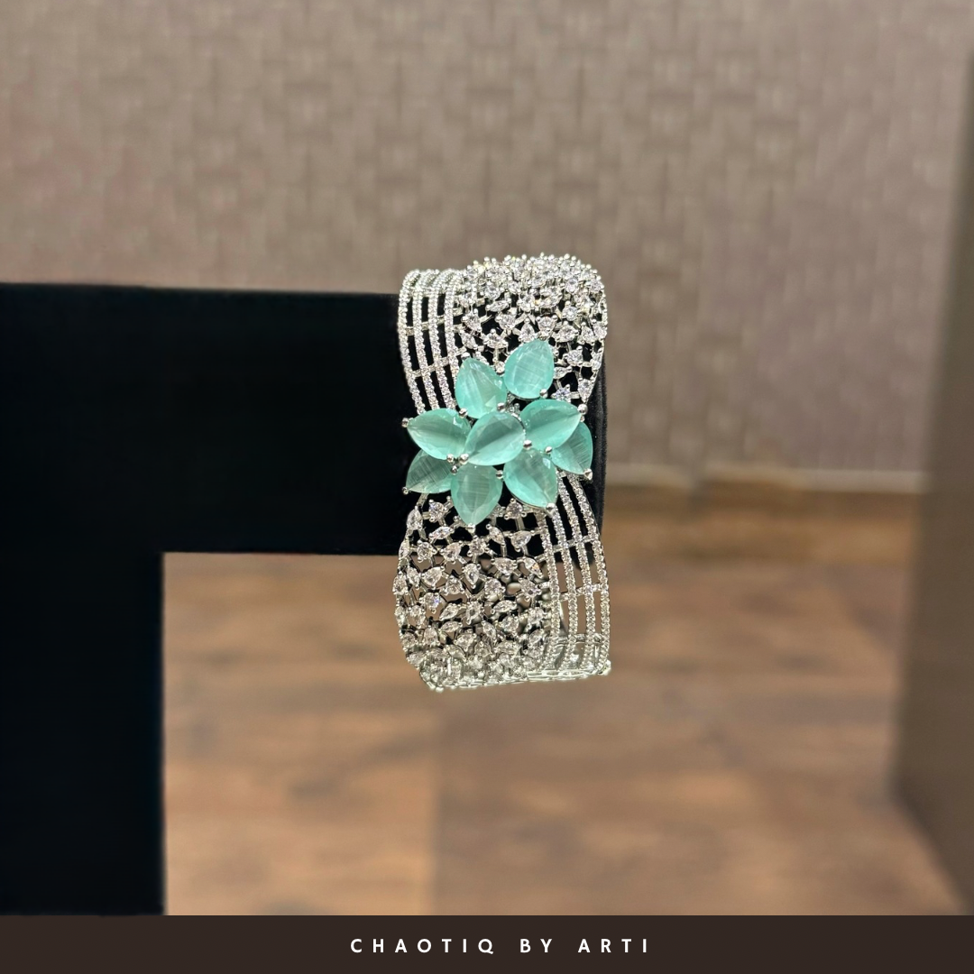 Maira flower shaped mint green and diamond studded bracelet