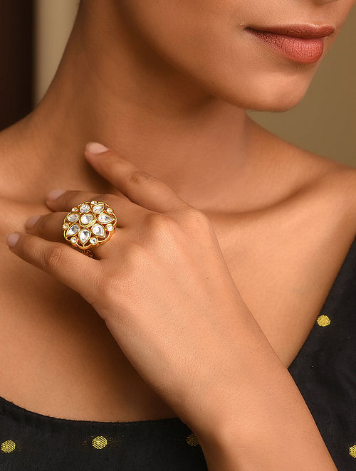 White coloured gold hued meenakari ring enhanced with kundan stones