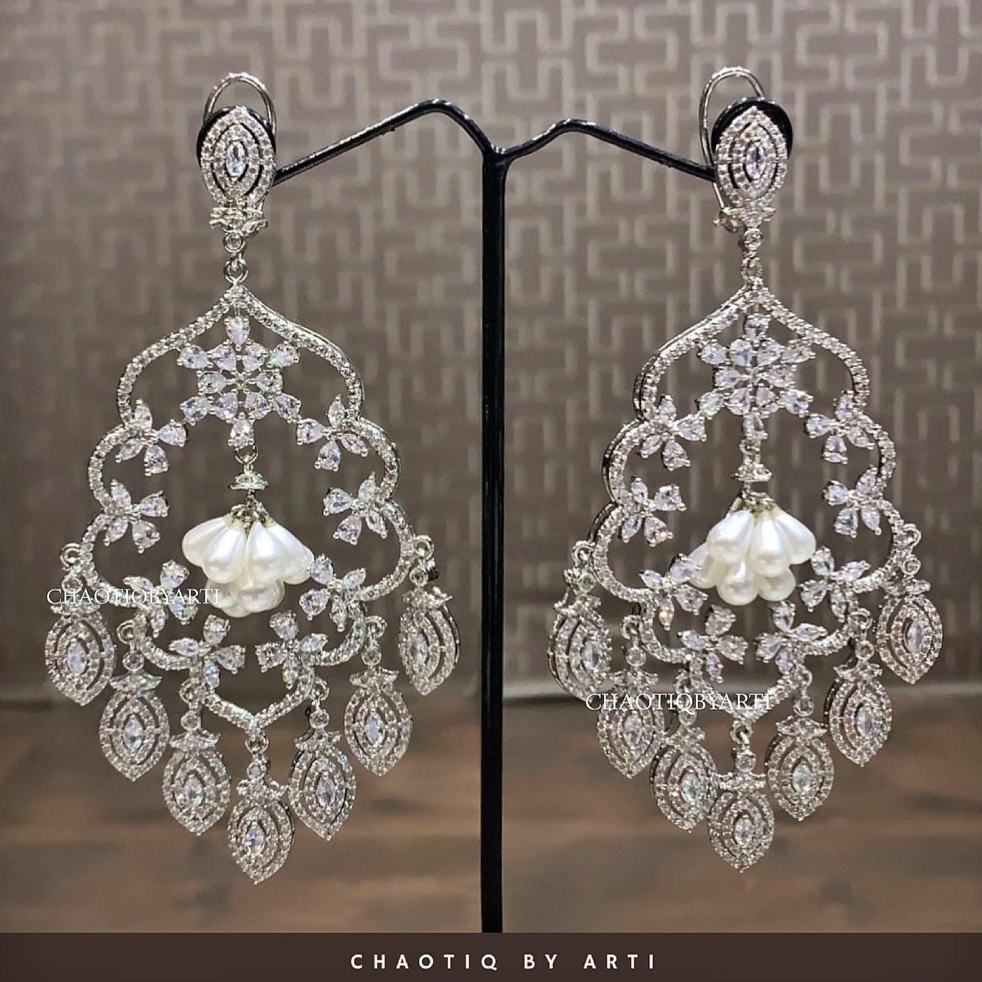 Nagma diamond studded danglers with pearl hangings