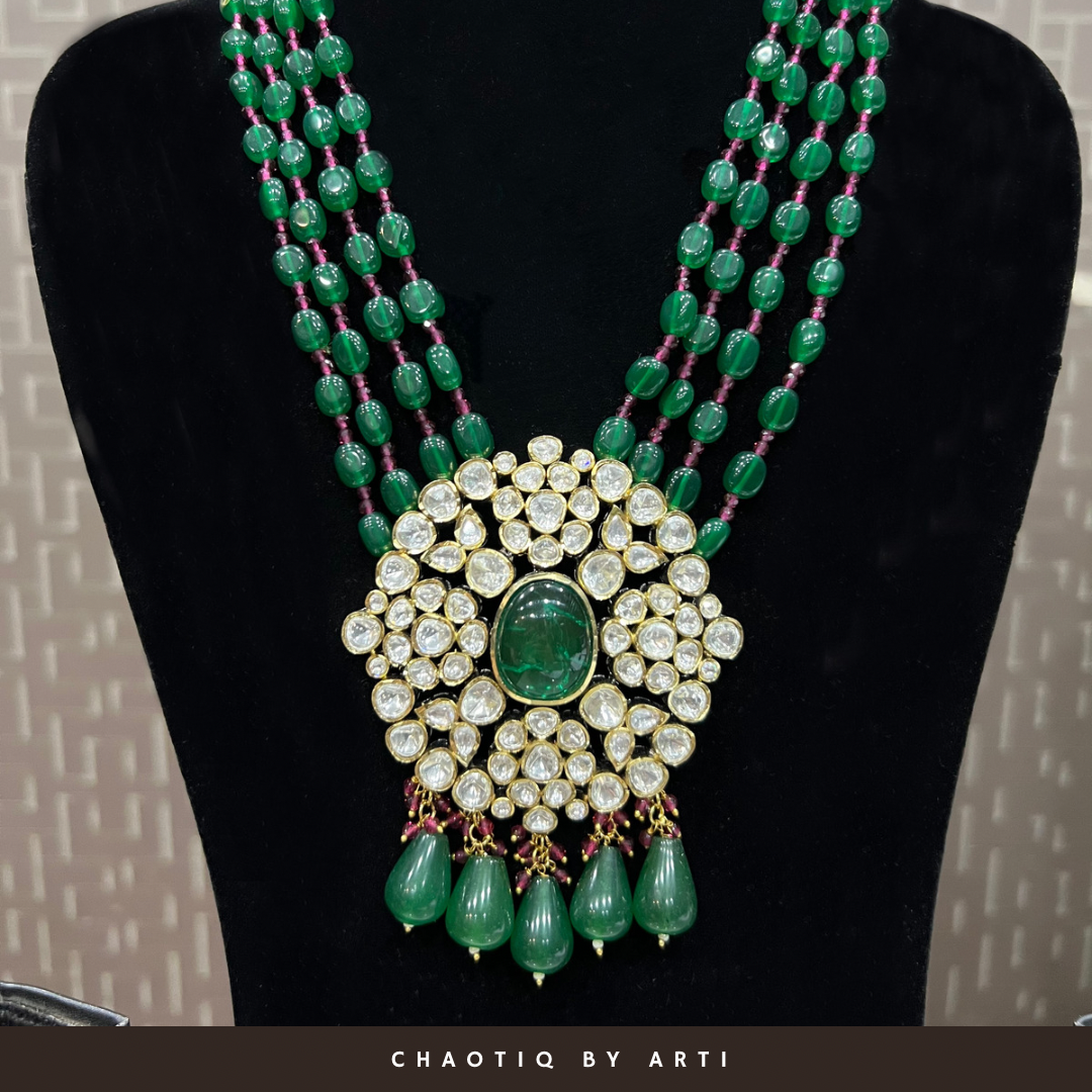 Sobitha emerald multi string necklace set