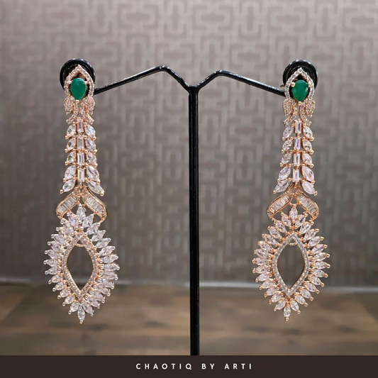 Emerald studded long diamond earrings