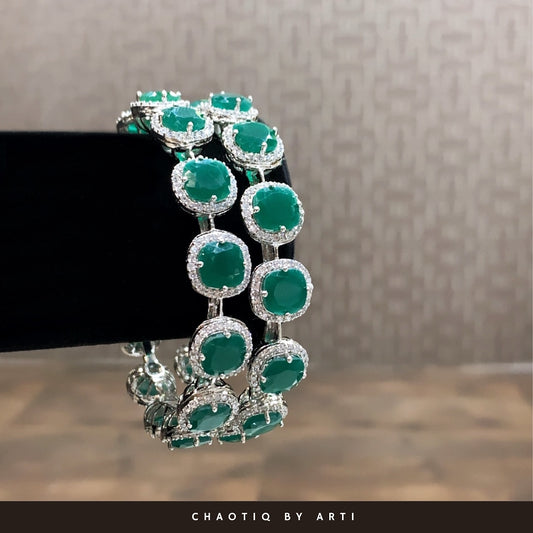 Emerald studded diamond bangles