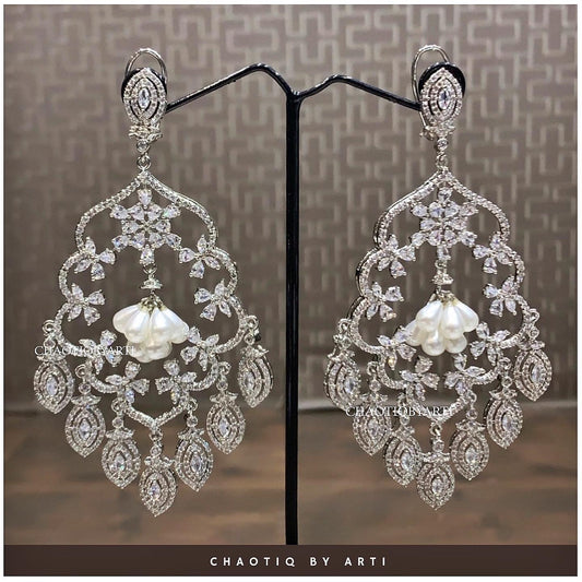 Diamond studded dangler earrings with pearl hangings